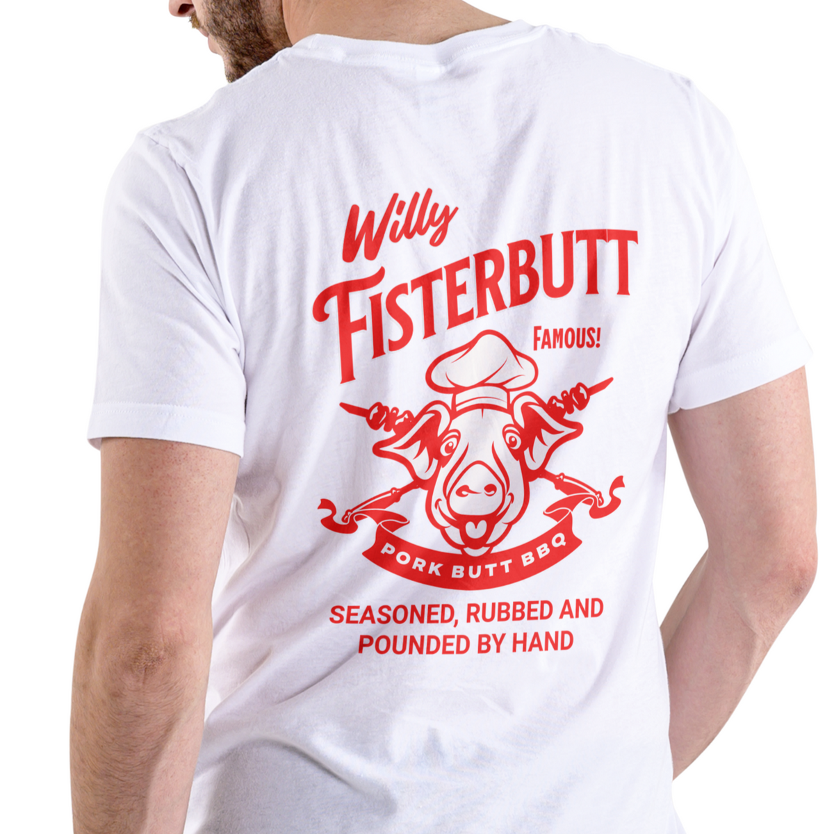 A man wearing a white t-shirt, viewed from the back. The shirt features a large red graphic print with the text 'Willy Fisterbutt FAMOUS! PORK BUTT BBQ' and an illustration of a pig wearing a chef's hat.
